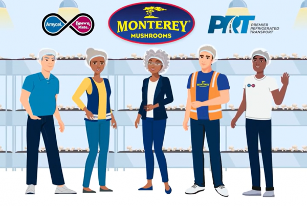 A still from the video created with Monterey Mushrooms; a group of employees stand together with the Monterey Mushrooms logo